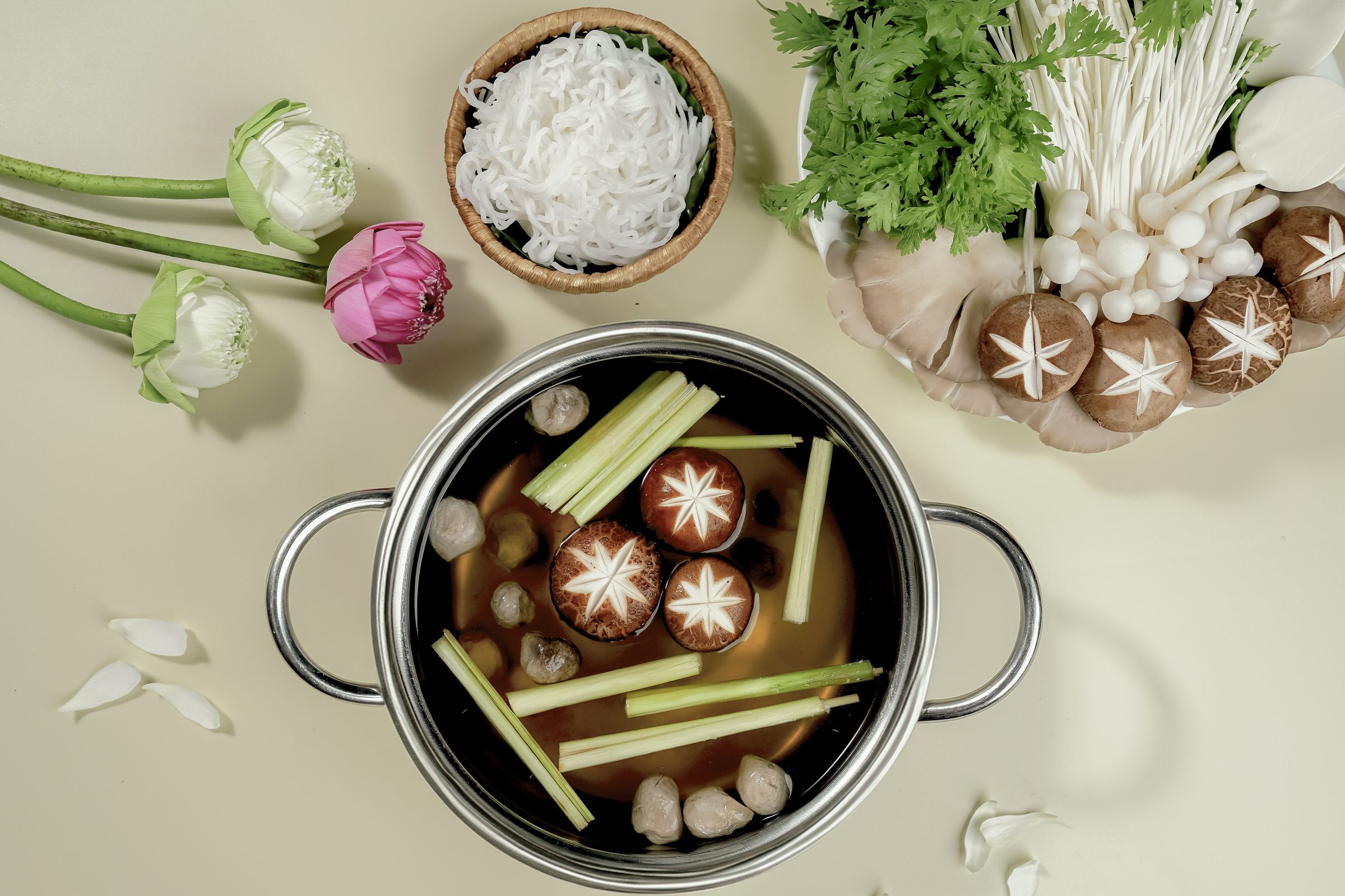 A steaming mushroom hot pot with broth simmered from vegetables